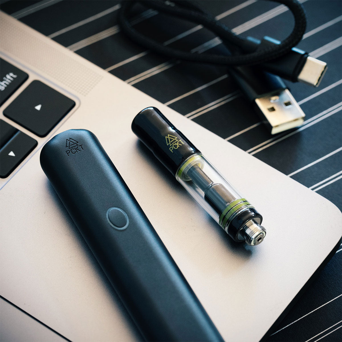 Pckt brand vrtcl vape device with sprk cartridge